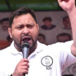 तेजस्वी यादव के राजभवन मार्च के दौरान तिरंगा लिए RJD कार्यकर्ता और पटना में तैनात सुरक्षा बल
