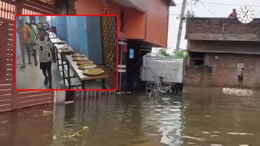 मुंगेर में बाढ़ पीड़ितों के लिए बनाए गए सामुदायिक किचन में भोजन